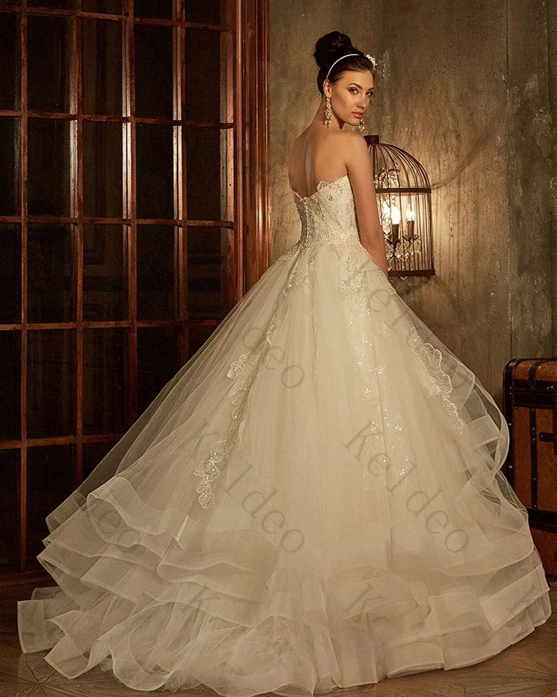 Customized Strapless A-Line Sleeveless Wedding Dresses Beading Crystal Sequin Lace Tiered Tulle Floor Length Backless Bride Gown