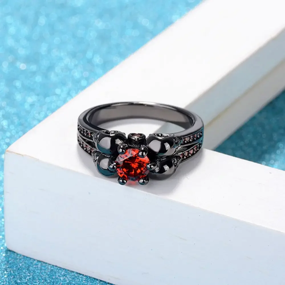 

Hot Sale Western Fashion Black Punk Skull Ring Personality Delicate Red Zircon Women Copper Ring for Popular Gothic Jewelry
