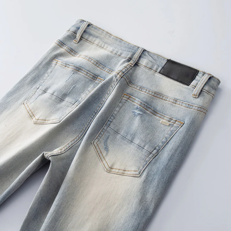 بنين المدارس الأمريكية شارع العليا المتعثرة الثقوب الزرقاء الأضلاع المرقعة الشارب تمتد نحيل ممزق الجينز #5