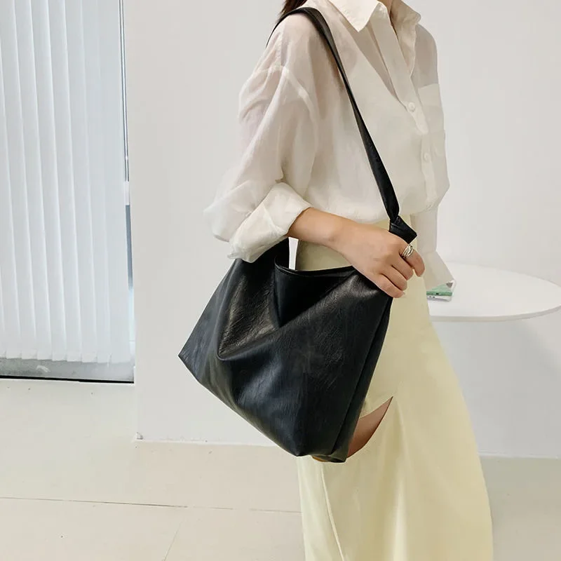 Contemporary Tote Bag Premium Leather Spacious Design Modern Minimalist Aesthetic Secure Storage Versatile Styling