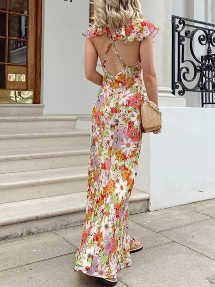 Abito da pendolarismo con temperamento primavera estate Stile sexy da donna Moda stampato Abiti floreali con scollo a V a vita media senza maniche senza schienale