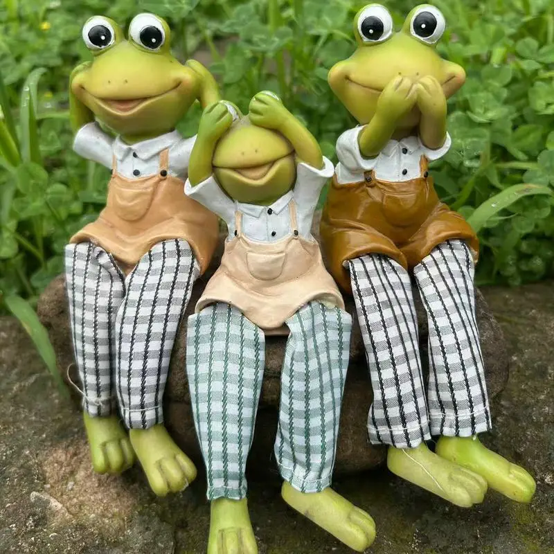 لا تستمع، لا تبدو، لا تتحدث زخرفة الضفدع