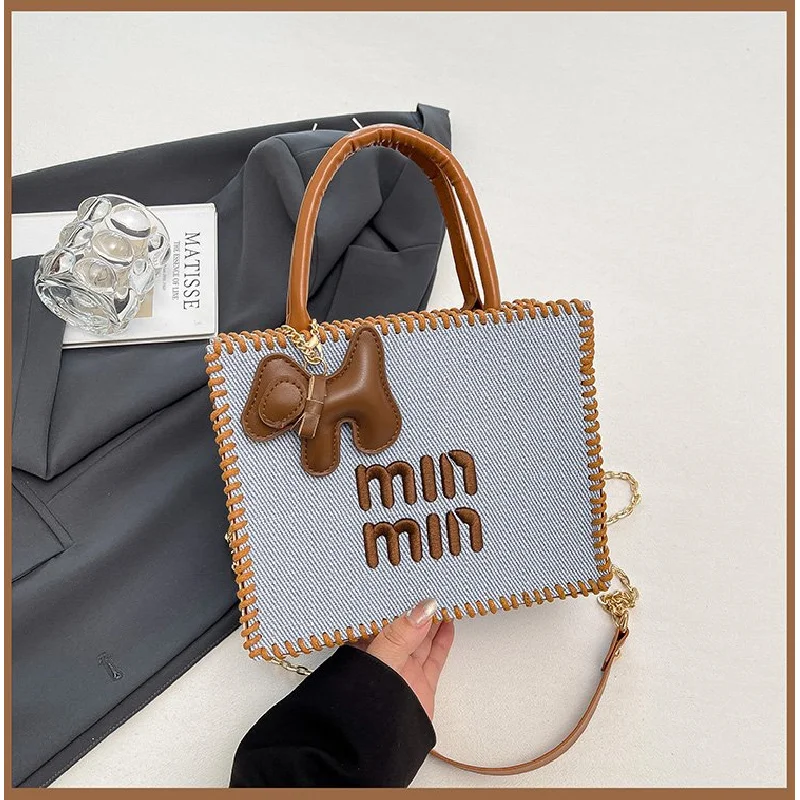 

Chic Commuter Crossbody Bag - Fashionable Leather Handbag With Designer Letter Logo, Elegant Minimalist Tote For Modern