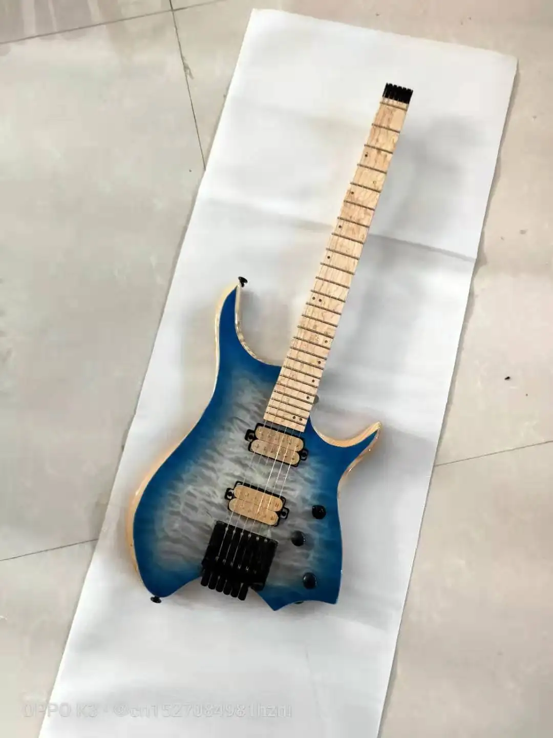 New 6-string headless electric guitar, classic water ripple veneer, high-end double-shake headless bridge, double pickup, free s