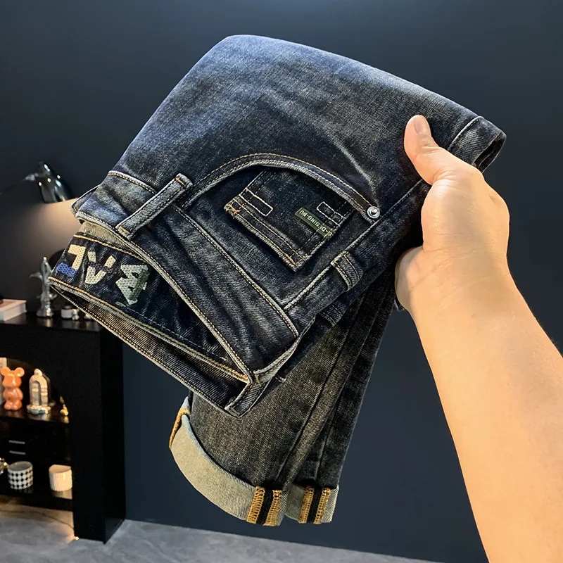 

Новинка 2023 года, джинсы для пирсинга Micro Haren для мужчин, тренд осенней моды, повседневные эластичные брюки с конической маленькой ногой