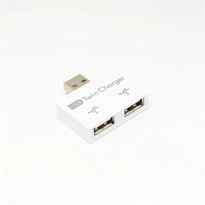 T85C محور USB صغير محمول إلى 2 منفذ شاحن مهايئ توزيع USB فاصل مزدوج USB شحن موسع للهاتف الكمبيوتر الأبيض