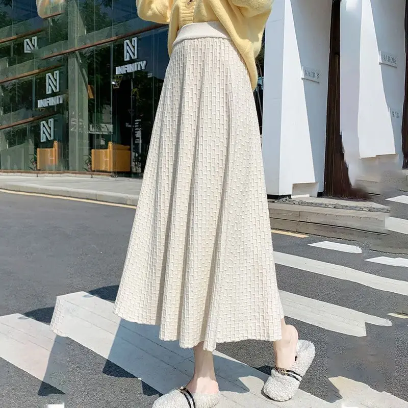 

Skirt female 2023 autumn and winter knitted skirt mid-length all-match thin high-waist A-line skirt Korean solid skirt fmale