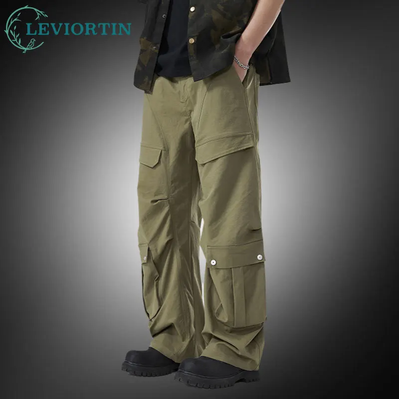 

Мужские зауженные повседневные брюки-карго с несколькими карманами, уличная одежда, с легкой заниженной промежностью, эластичные брюки-карго с манжетами на талии