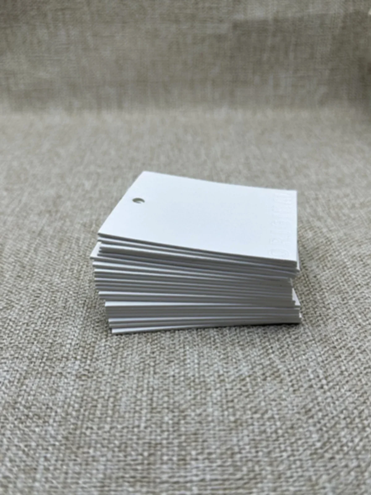 clothing universal hanging tag high-end embossing process thickened white card，Please contact us for customization