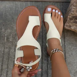 Damskie minimalistyczne sandały stringi PU skórzane z wystającym palcem damskie buty na plażę lekkie miękkie dla kobiet seksowne kapcie sandały klamra