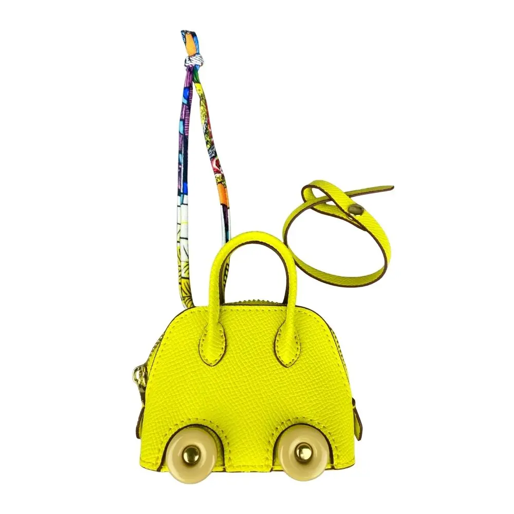 Mini-Taschenanhänger aus Leder mit niedlichen Rädern – Kopfhörer- und Lippenstiftbeutel mit zwei Riemen – PU-Leder – ideal für Taschenzubehör – Detail 8