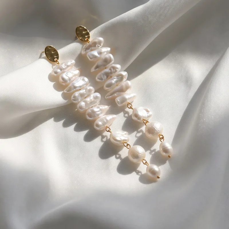 Elegant high-class cold wind irregular imitation baroque pearl fringed beaded earrings simple pendant stud earrings