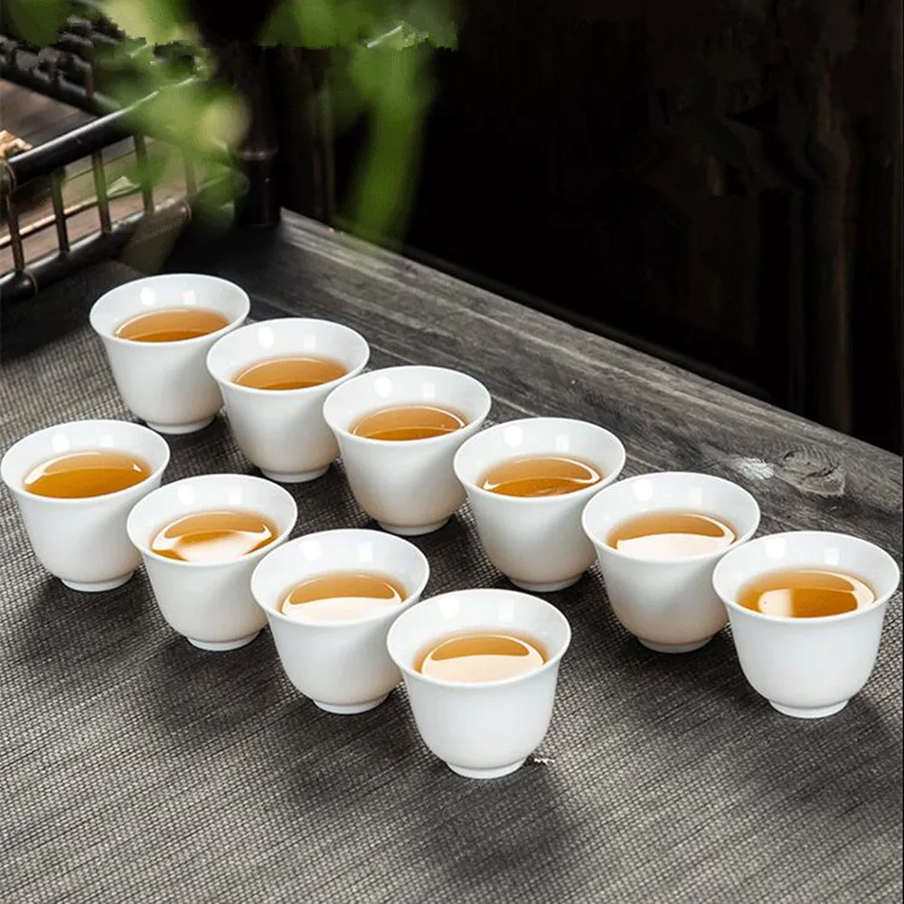 10 sztuk / opakowanie Dehua Wysoka biała porcelana Czysta biała ceramiczna filiżanka do herbaty Ręcznie robiony zestaw do herbaty Kungfu Prosty zestaw filiżanek do herbaty Pu'er do użytku domowego