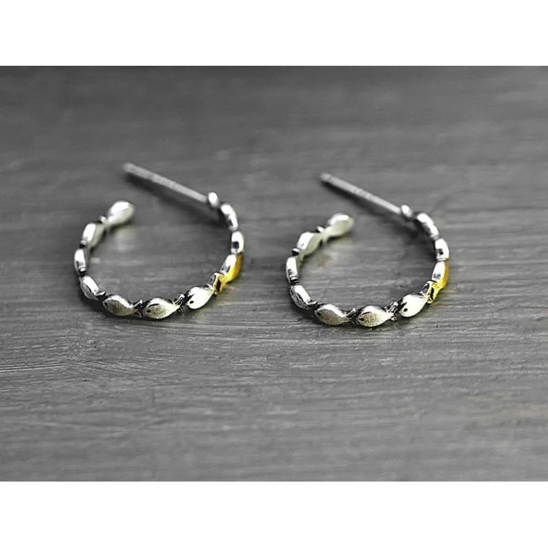 2025 New Cute Charm Girl Earrings A Group of Fish Hollowed Out Ear Hoops Dual Color for Women