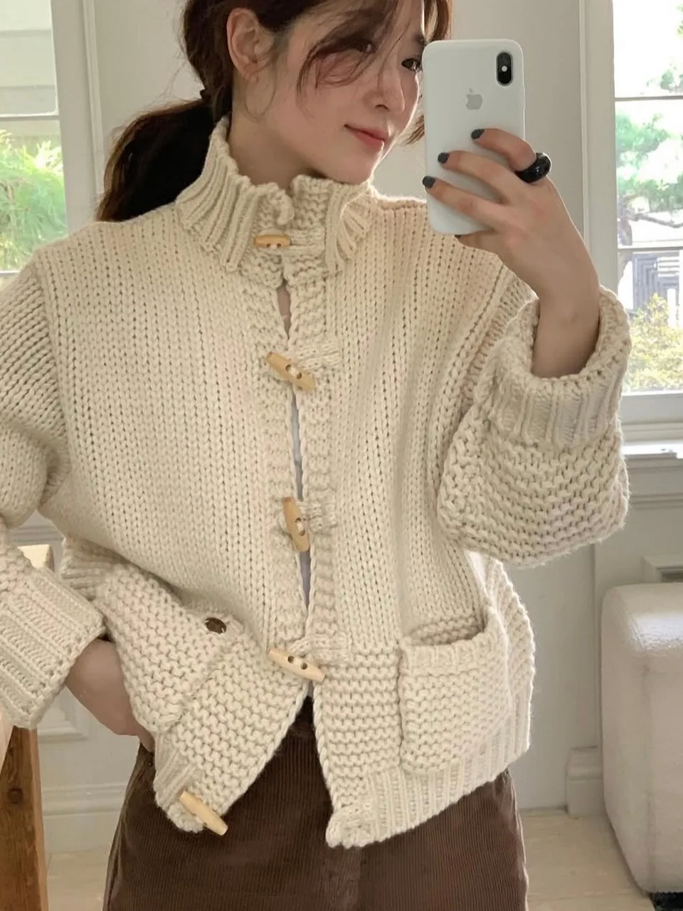 

Осенний новый женский вязаный свитер, пальто с воротником-стойкой, ленивый модный дизайн, универсальный открытый кардиган для снижения возраста