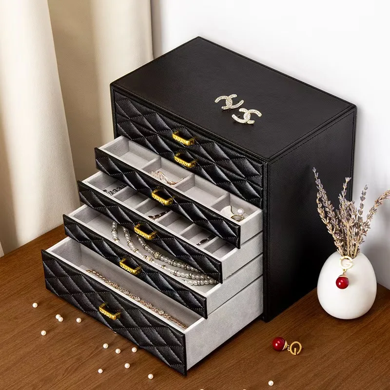 Jewelry storage box, a high - end six - layer drawer - style box made of diamond - lattice pearl - textured PU leather.