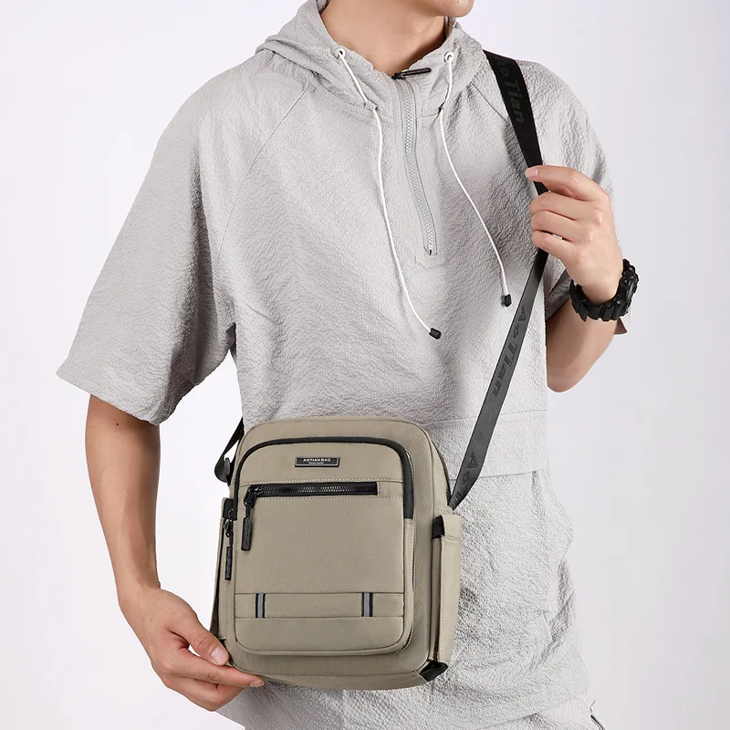Simple vertical square single-shoulder bag, waterproof Oxford fabric 8-inch flat storage, durable commuting crossbody bag