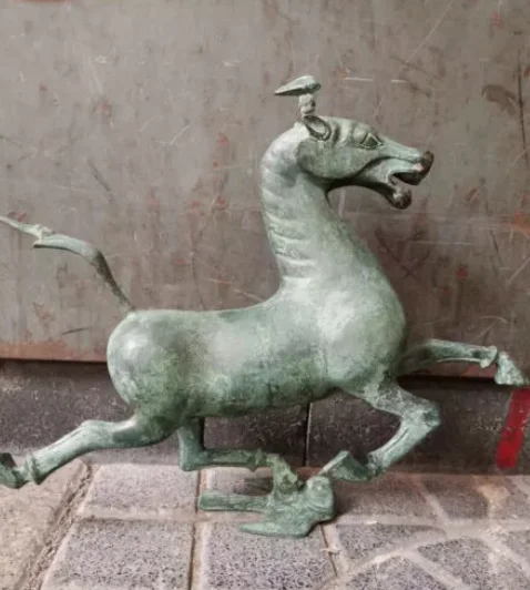 Antique Old Patina Bronze Galloping Horse Treading on a Flying Swallow Statue