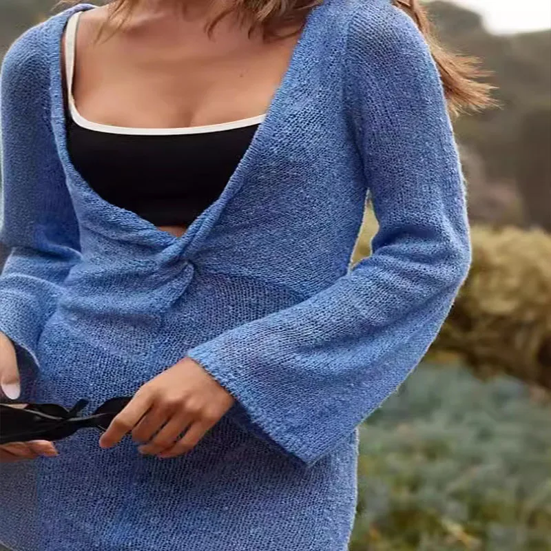 Hot sale ummer new women's long-sleeved smock beach hollow holiday knitwear