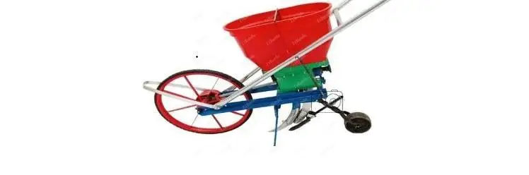 *Kleine agrarische bemesting artefact graan hand push-top dressing zaaimachine