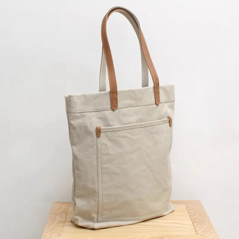 AETOO Simple and versatile, large-capacity commuter tote bag that can hold a laptop, high-density heavy-duty canvas bag, shoppin