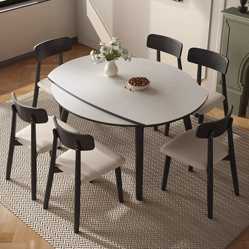 The combination of rock board dining table and chair is simple, modern, scalable, square and circular, and can be used