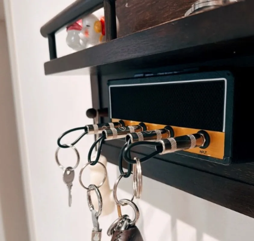 Suitable for socket hanging key wall mounted key storage box base audio keychain speaker suspension