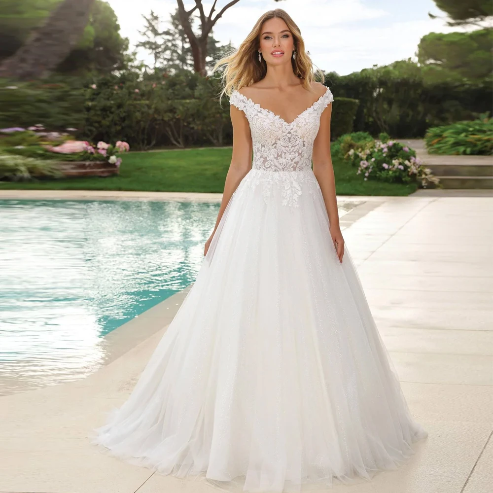 Abiti da sposa personalizzati con spalle scoperte Scollo a V Abiti da sposa con applicazioni in pizzo Illusion Ball Gown Lunghezza pavimento Tulle Vestido de novia