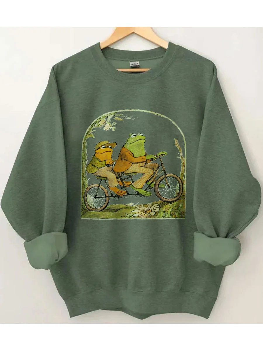 Vintage Cute Cartoon Two Frogs on A Bike Ride in Spring Print Women Sweatshirt Retro Elegance Spring Trip Comfort Female Sweater