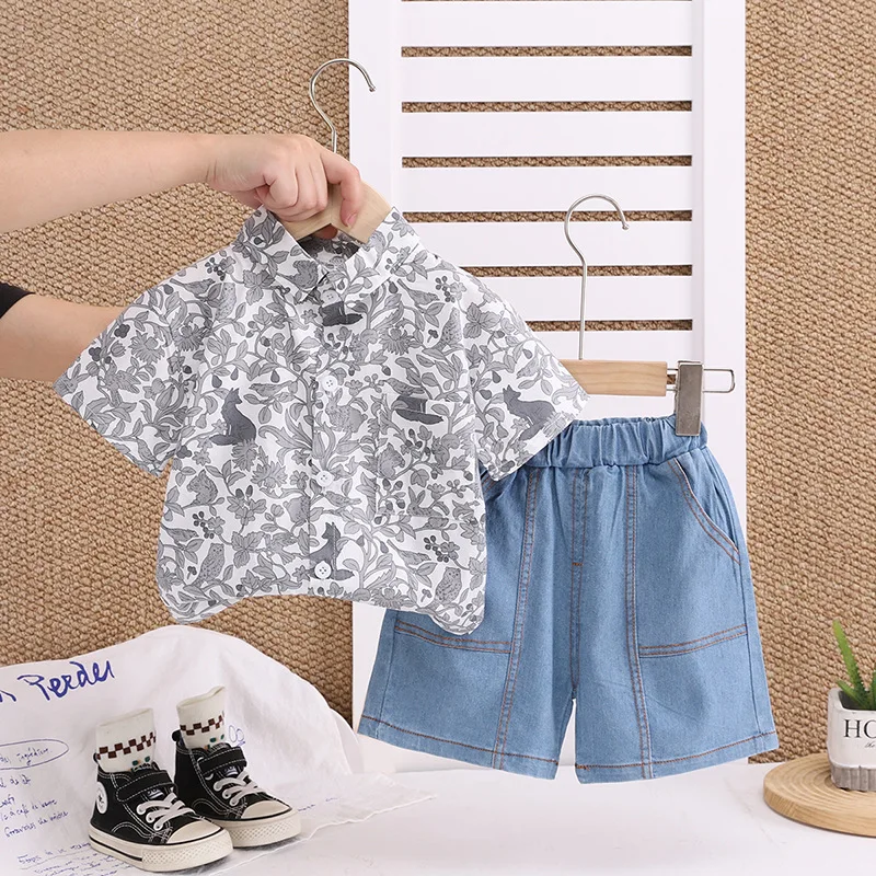 

Новый летний комплект детской одежды, детский костюм с короткими рукавами, рубашка, шорты, 2 шт./компл., детская одежда для мальчиков, повседневный костюм с героями мультфильмов для младенцев