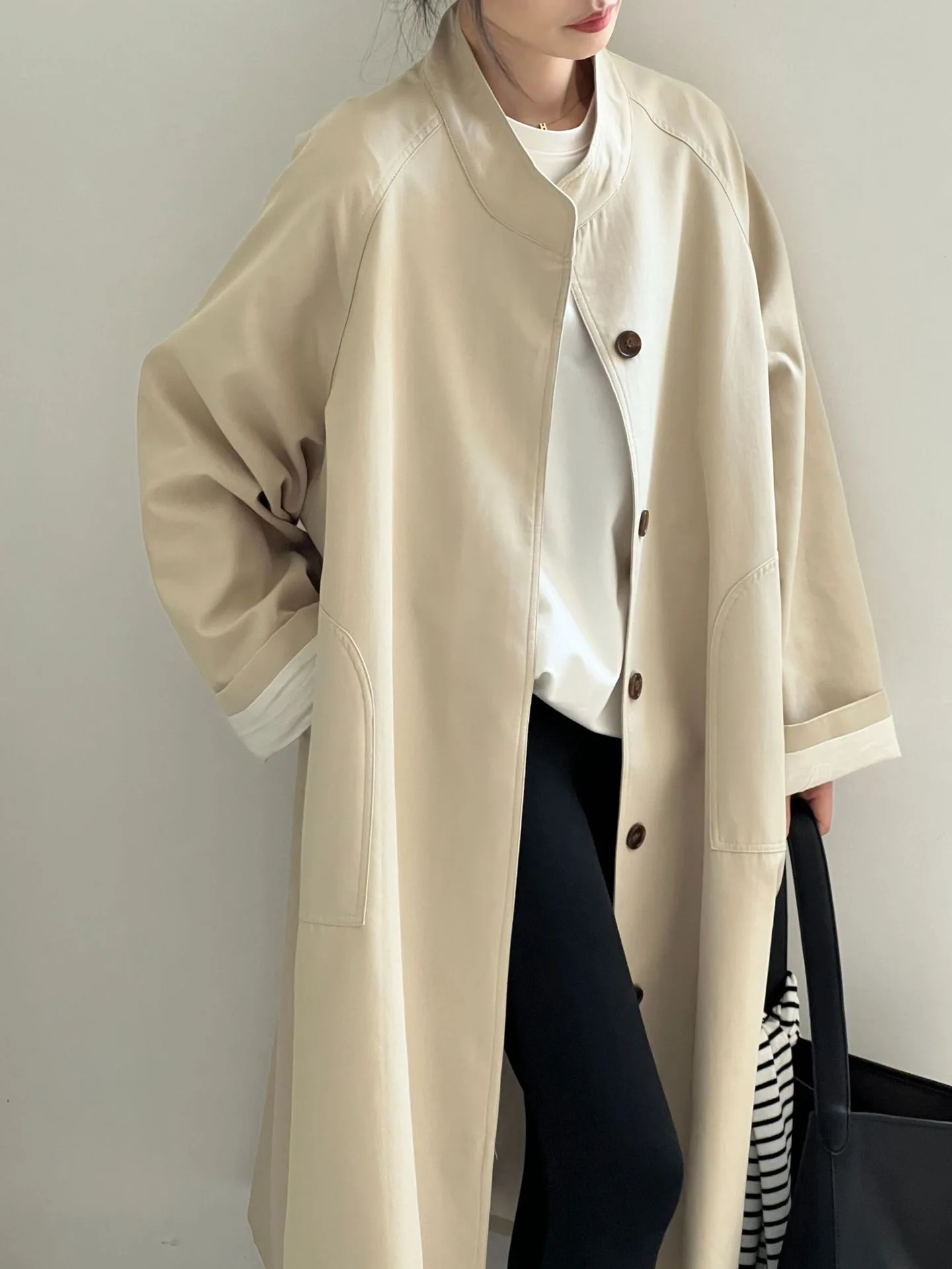 Gabardina de longitud media con cuello levantado de estilo británico para mujer en otoño e invierno 2025, nuevo abrigo informal y de alta gama