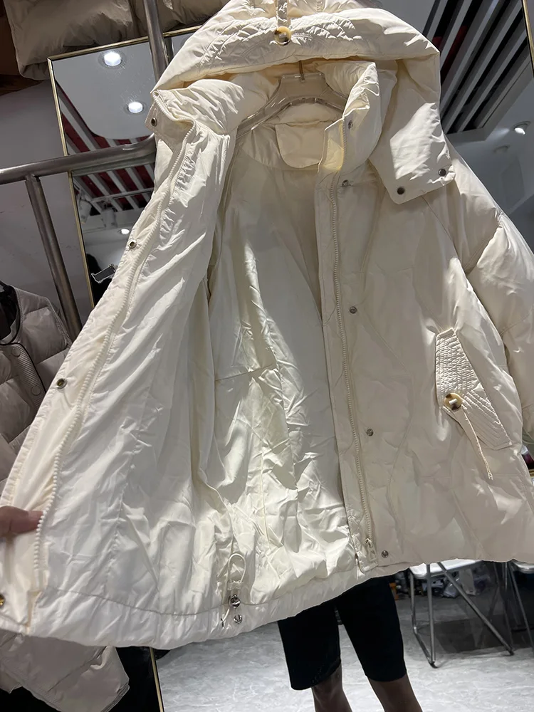 Chaqueta de plumón medio a largo para mujer, nueva edición coreana de invierno, Sudadera con capucha a la moda, abrigo holgado Simple y cálido de plumón de pato blanco