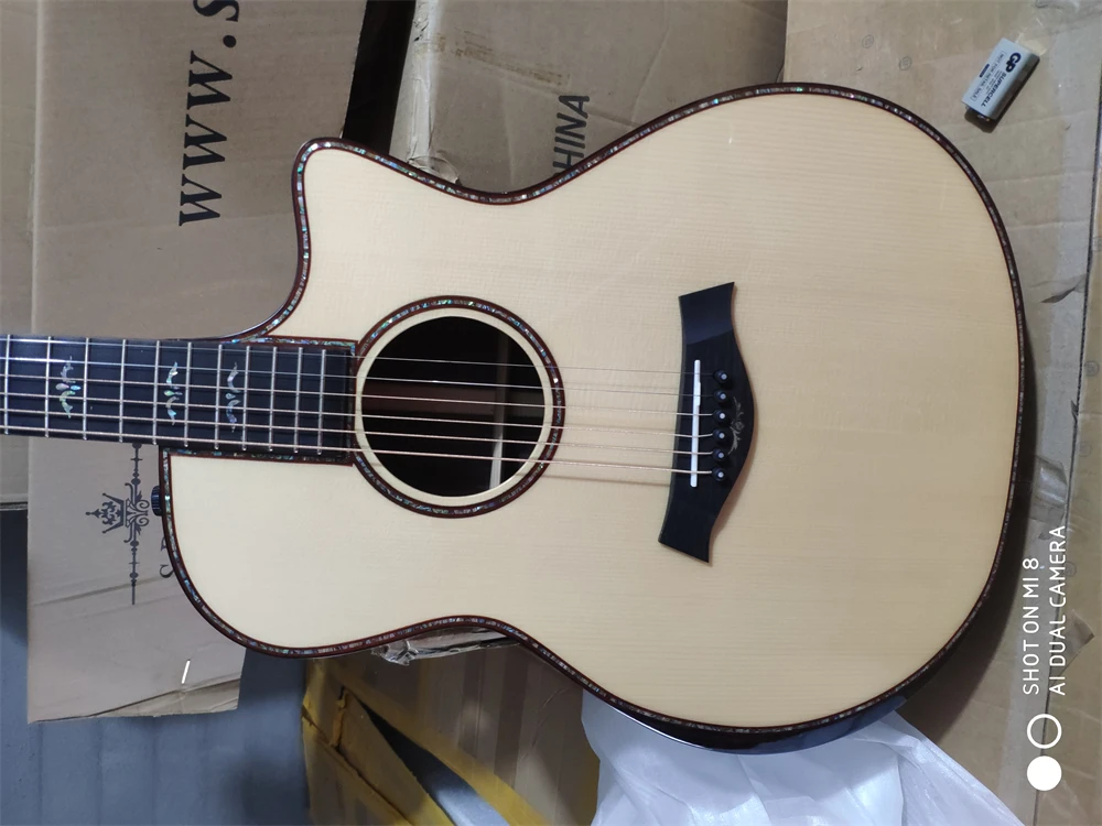 Handmade solid wood acoustic guitar with rich tone and superior craftsmanship for an exceptional playing experience