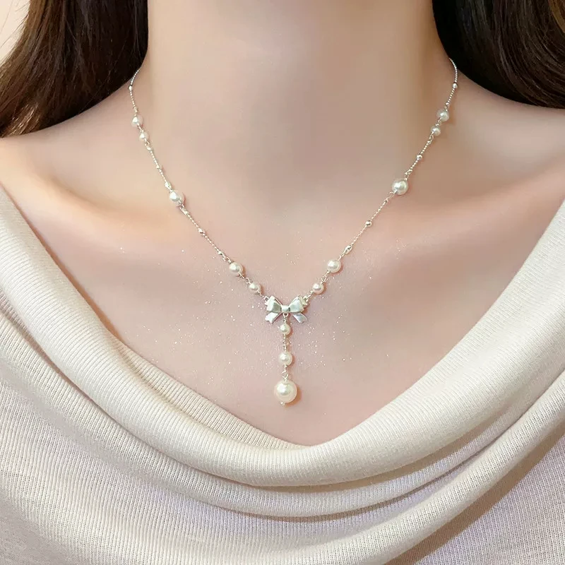 collier-de-perles-raytimone-pour-femme-nouvelle-collection-2026-chaine-de-pull-motif-nœud-etoile-design-unique-bijoux