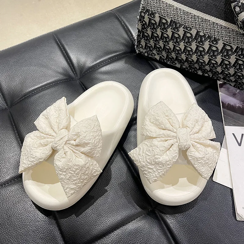 New EVA thick-bottomed bow cool slippers women's summer wear fashion Internet celebrity indoor home sweet one-word drag