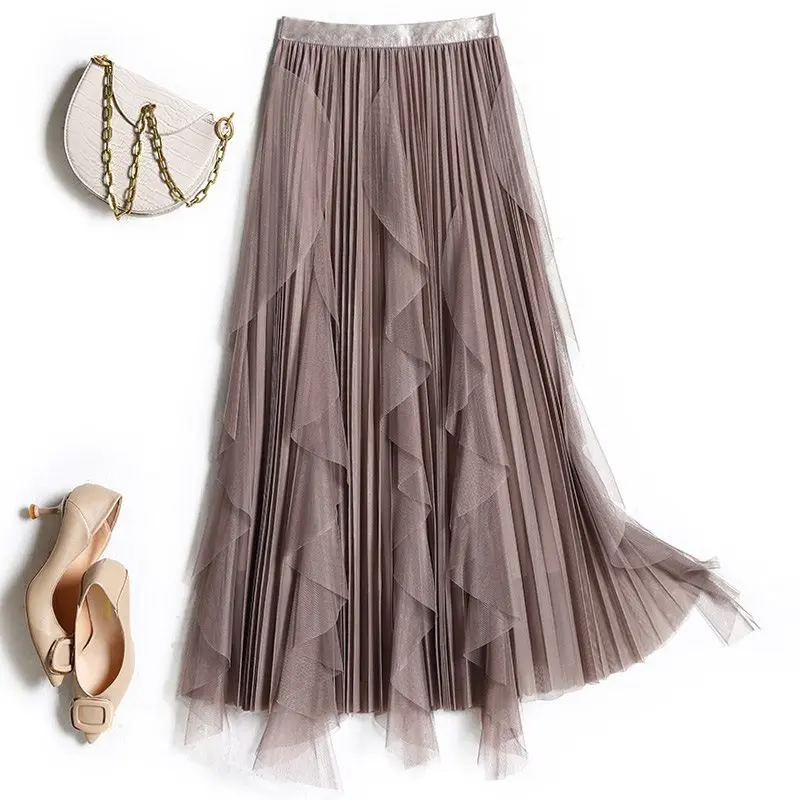 Saia de gaze irregular bege feminina outono e inverno cintura alta uma palavra malha plissada saia de balanço médio e longo
