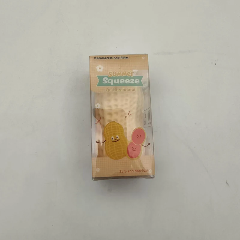 Pindaknijptoy met langzaam oplopende TPR-knop, textuurrijk omhulsel, draagbaar speelgoed voor tieners en studenten voor tijdens de pauze op het bureau.