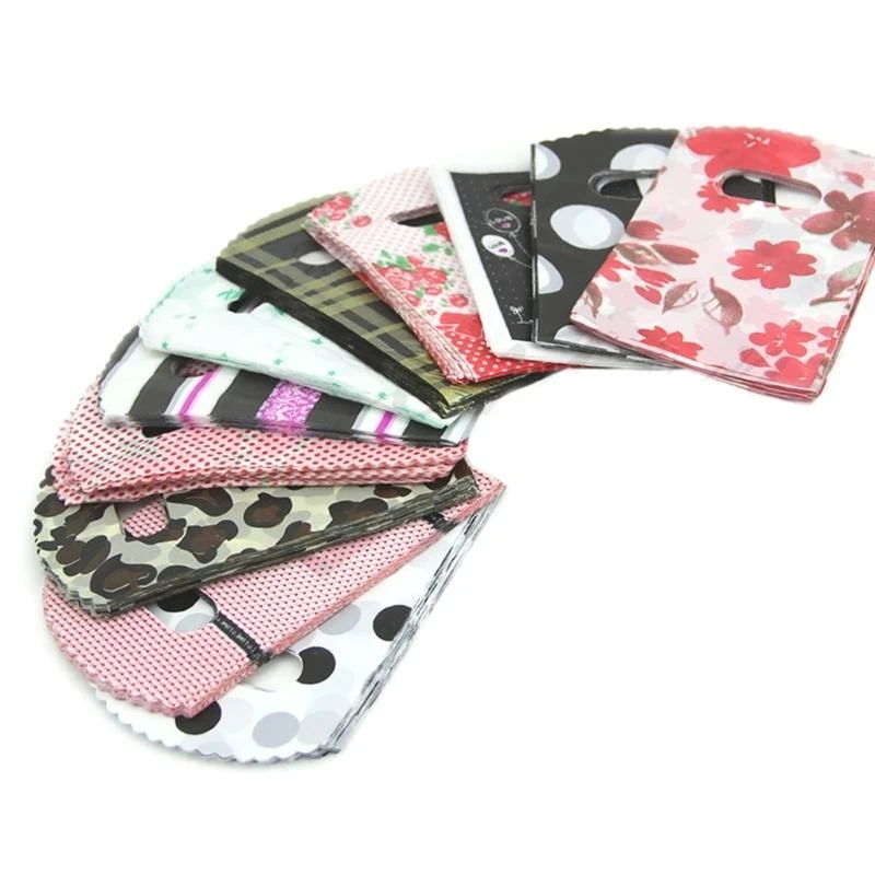 F92B Petits sacs en plastique Ensemble 50 points fleur fleur conception conception cadeaux délicats