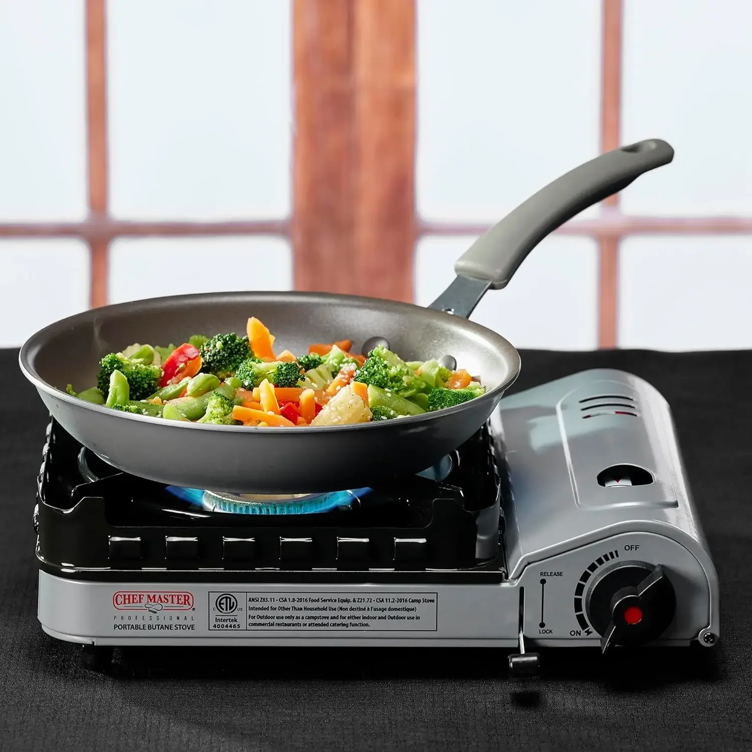 Chef Master #90019 Portable Butane Camping Stove: 15,000 BTU, Piezo ignition, double wind-guard for camping.