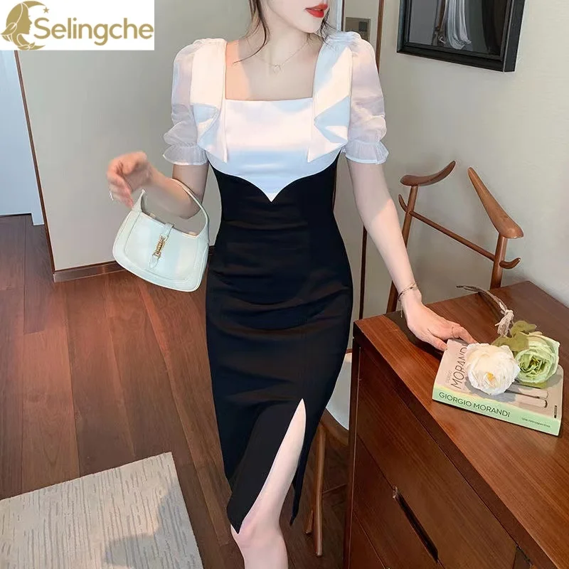 

Korean Version of Socialite Sweet and Elegant Bow Neck Short Sleeved Dress with a Hepburn Style Buttocks Wrapped Black Skirt