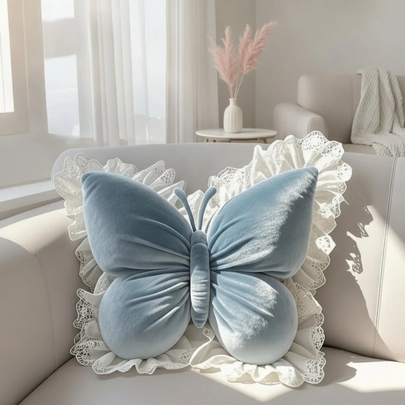 Butterfly-shaped cushion adorned with a delicate butterfly motif and