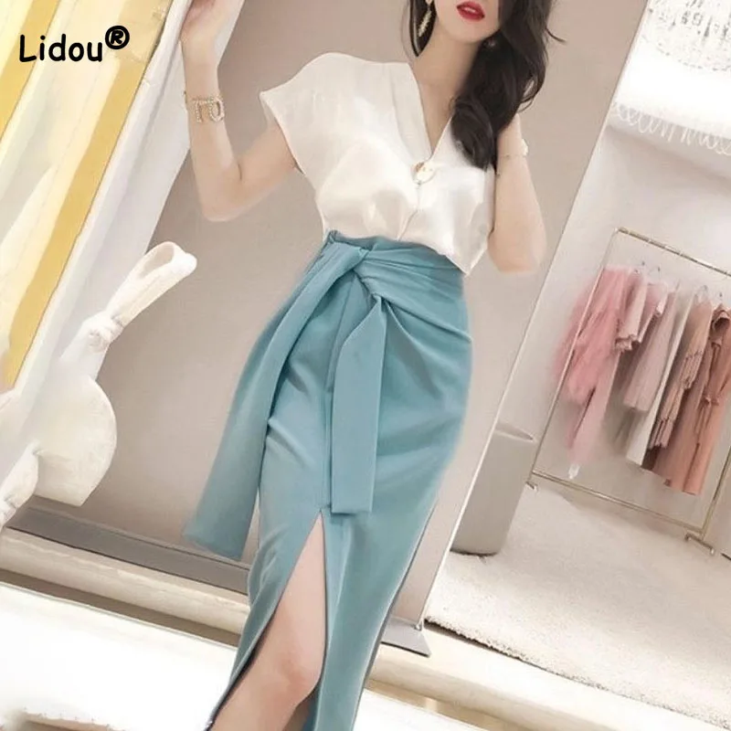 Mode 2024 Lente Zomer Nieuwe Elegante Vrouwelijke Hoge Midi Taille Split Rokken Office Lady Koreaanse Bandage Tas Hip Skinny Rokken