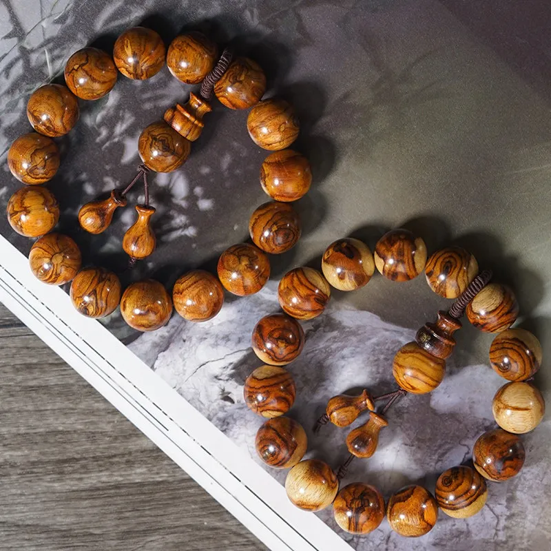 

Hainan Huanghuali Eye Ghost Grain Old Material Kang Pear Mala Bracelet Fidget Play Collectible Wenwan Wooden Jewelry