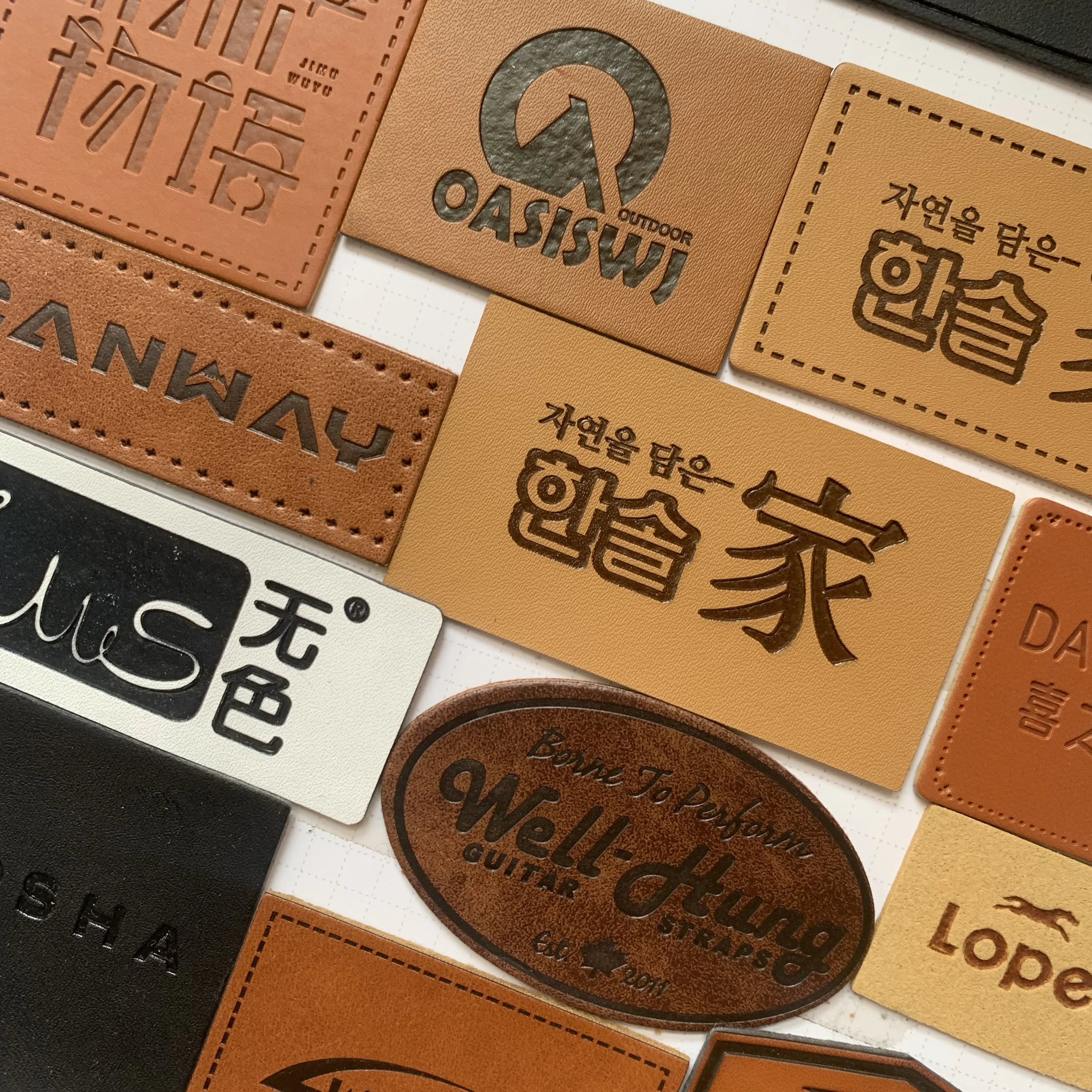 Small batch custom leather label jeans clothing leather label PU genuine leather microfiber trademark custom leather labels