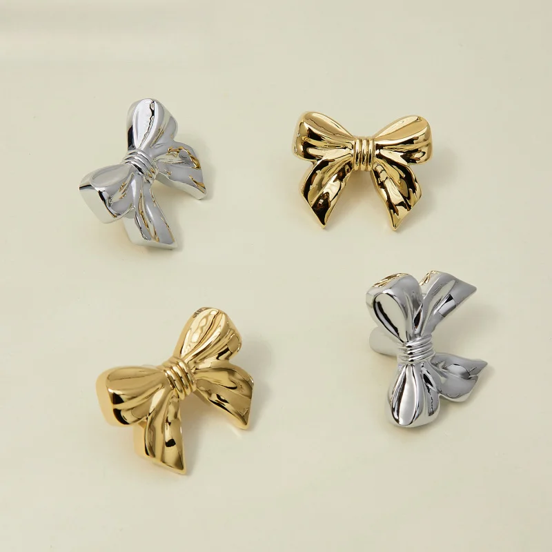 Brass bow tie design children's room creative French-style drawer handle, modern minimalist single-hole wardrobe door handle, fu