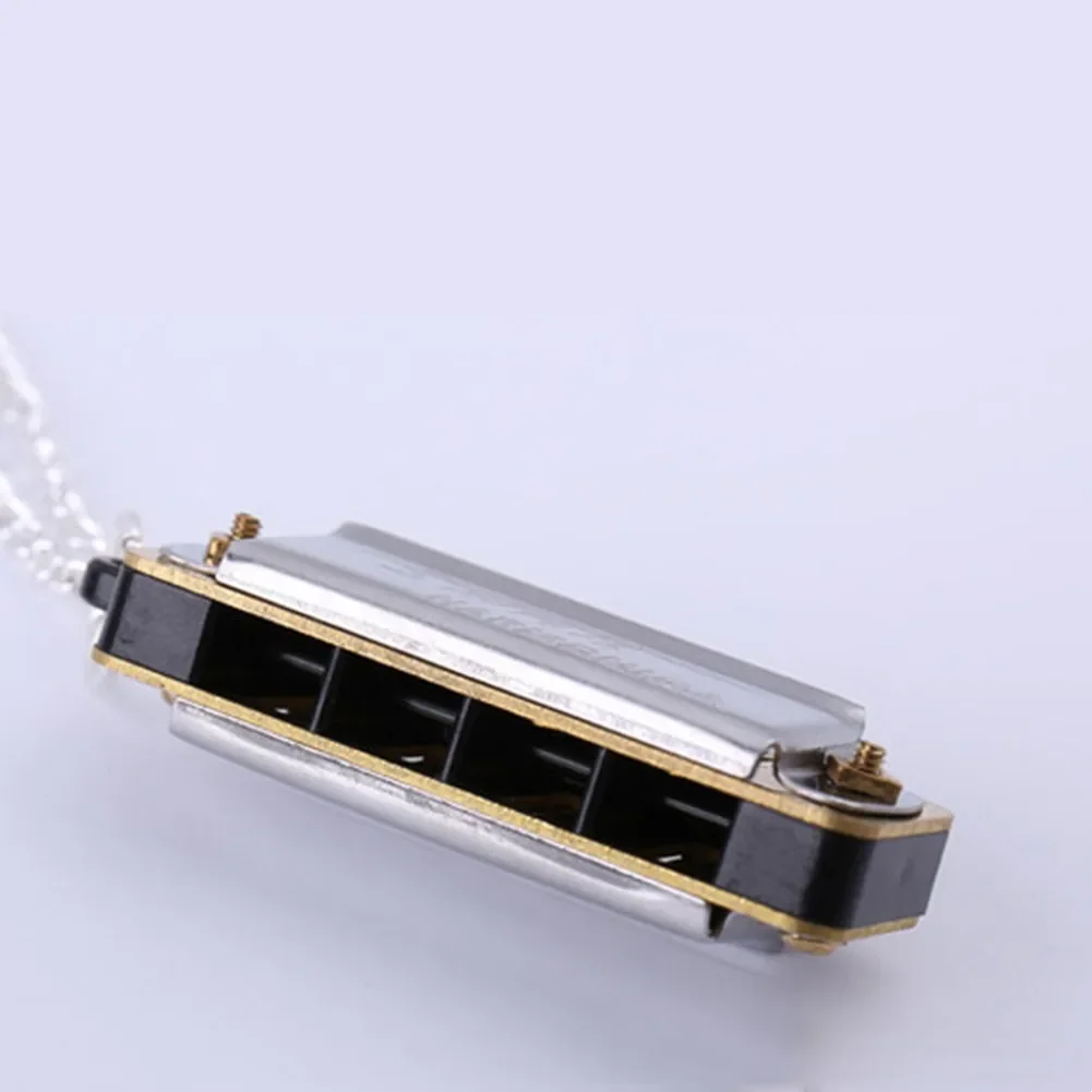 

Swan Mini Harmonica Keychain 4 Holes 8 Tone Portable Small Mouth Organ Portable High Quality Musical Instruments 35x13x11mm