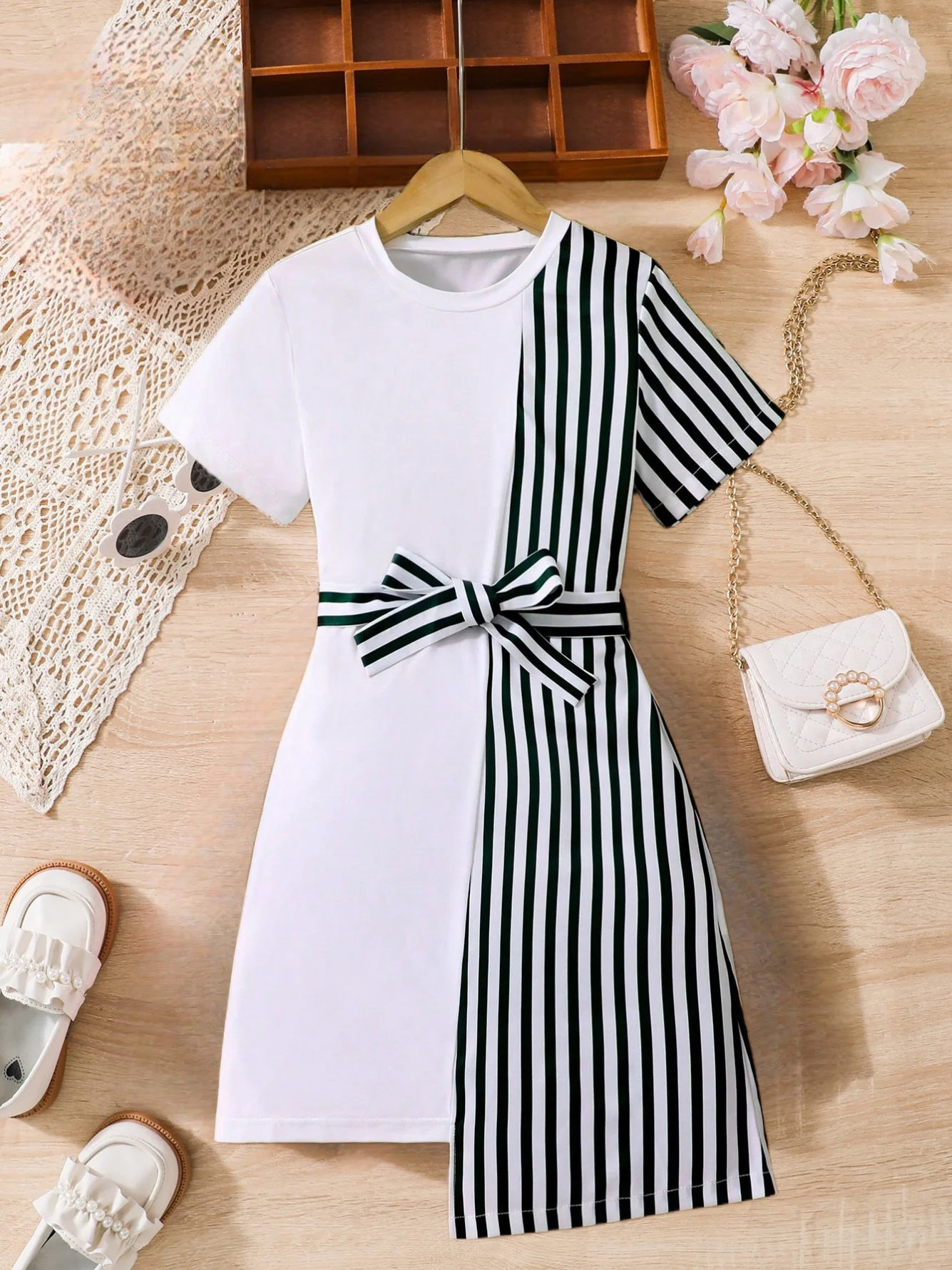 Girls black and white striped dress: stylish belt design, elegant bow decoration