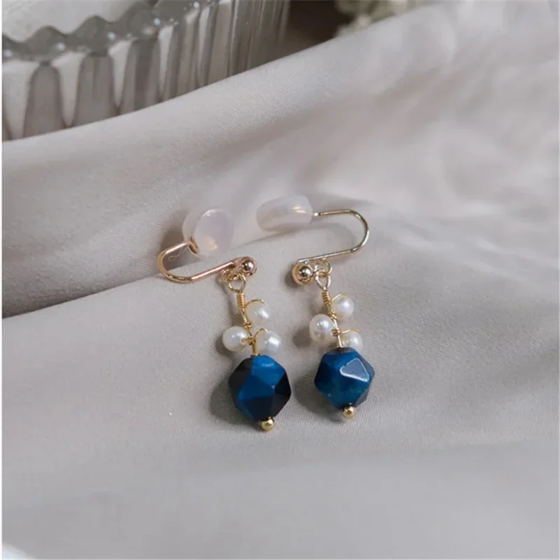 Anting-anting Pesta indah wanita anting-anting indah romantis klip telinga mutiara alami batu mata harimau biru buatan tangan desain asli