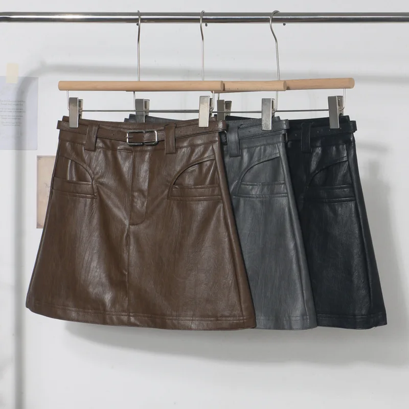 

2025 Autumn Winter Fashion with Belt Retro Design A Word Pu Leather Skirt Women Short Skirt