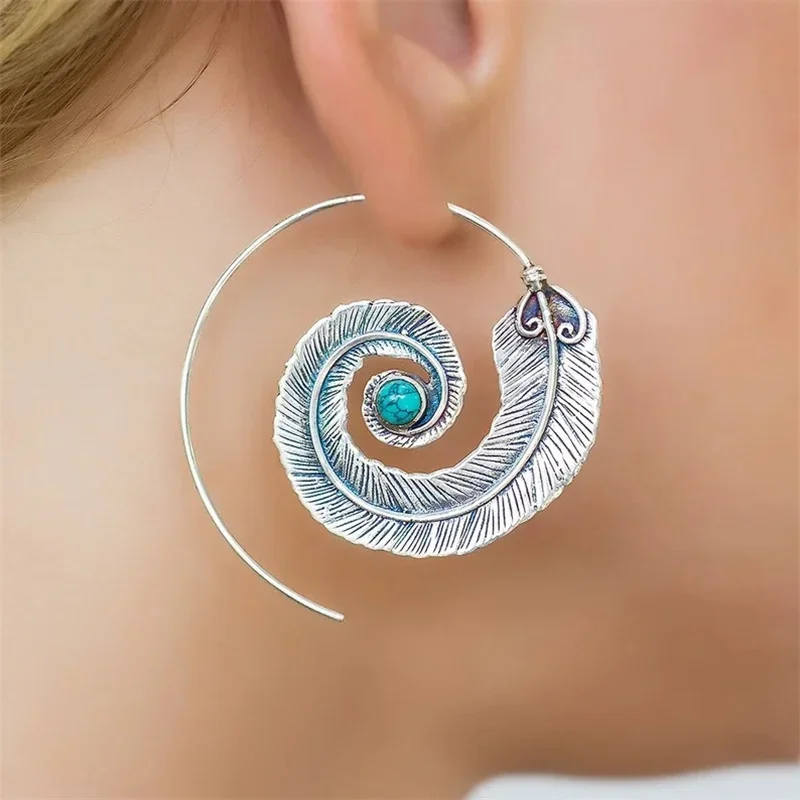 Pendientes geométricos de aleación de plumas en espiral para mujer, joyería turquesa con incrustaciones de personalidad europea y americana, Nueva joyería